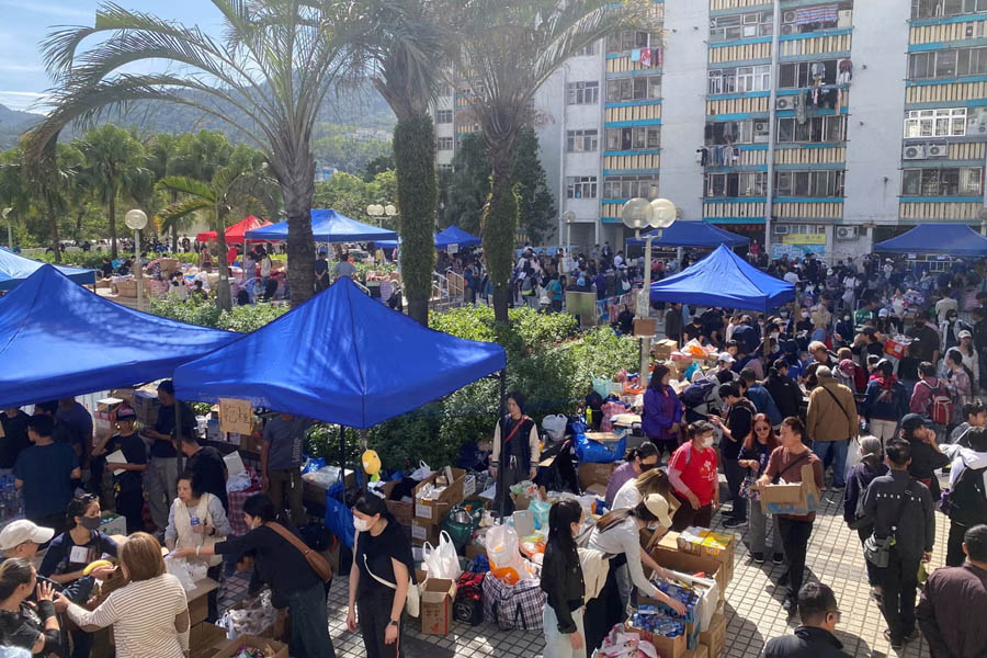 A volunteer-run resource collection point providing relief supplies to residents impacted by the Hong Kong apartment complex fire.