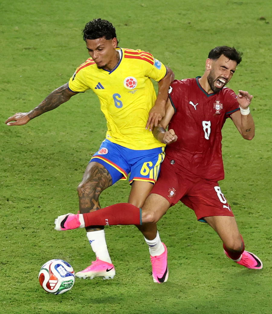 Richard Rios is challenged by Bruno Fernandes in an exciting encounter between Colombia and Portugal in Miami