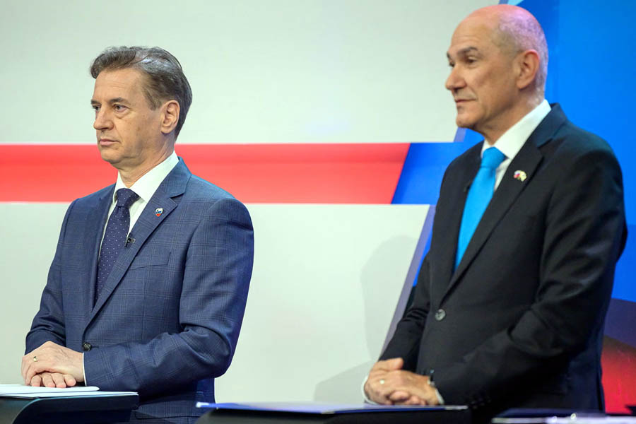 Robert Golob and Janez Janša participating in a televised debate in Slovenia, discussing policies and election issues before the 2026 parliamentary vote