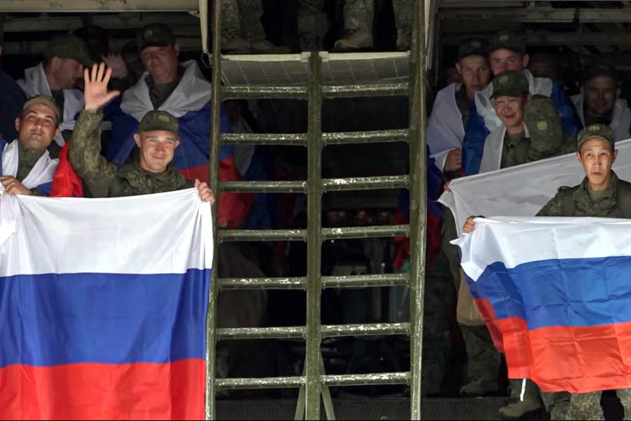 Russian POWs celebrated upon arriving at Chkalovsky air base after a prisoner swap, as Zelenskyy revealed that Russia returned at least 20 of its own fallen soldiers in the exchange.