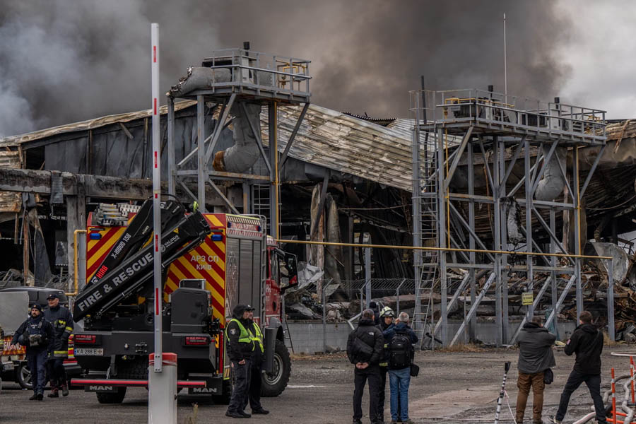 Plumes of smoke and emergency vehicles in Kyiv after overnight Russian missile attacks that killed civilians and injured dozens across Ukraine.