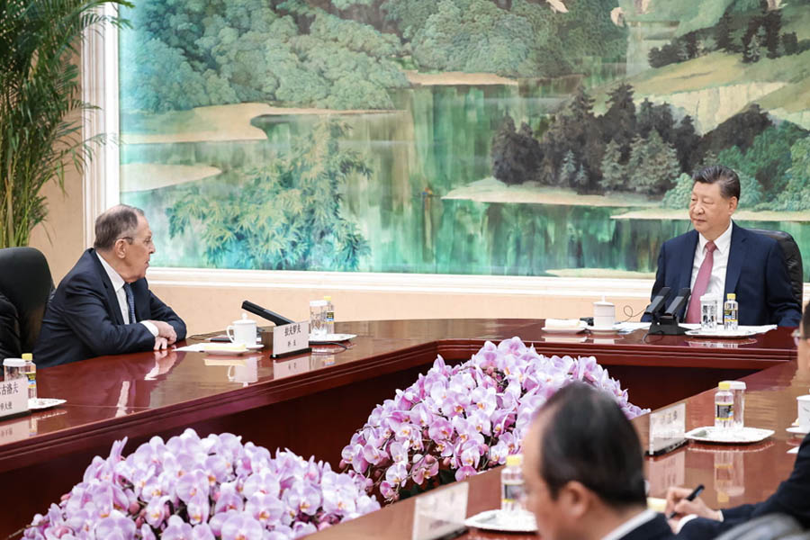 Russian Foreign Minister Sergei Lavrov meets with Chinese President Xi Jinping during high-level talks in Beijing, China.