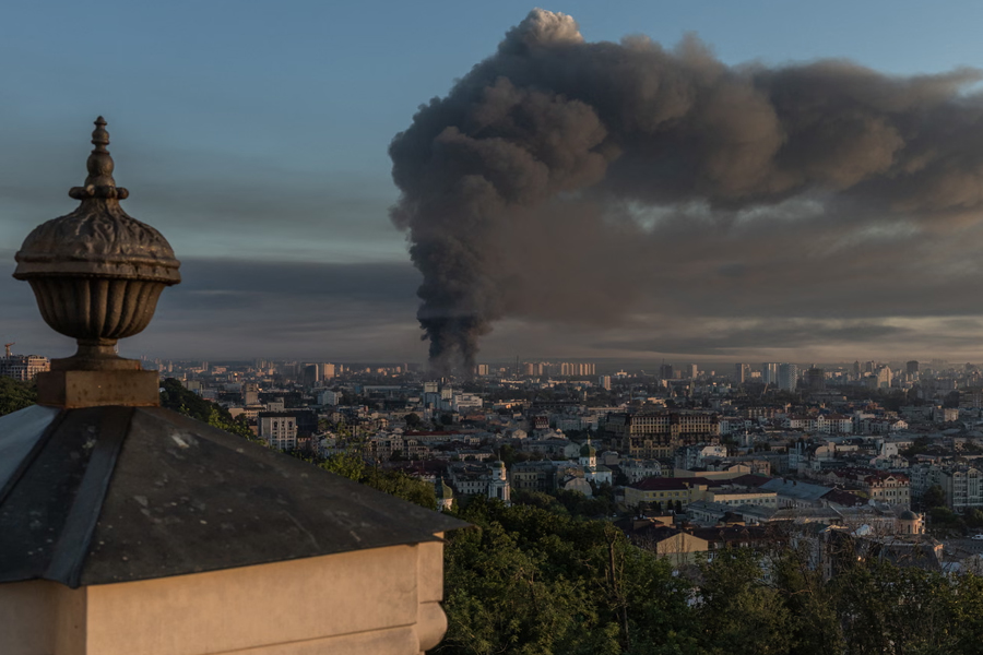 Smoke rises over the city following a Russian air attack on Kyiv.