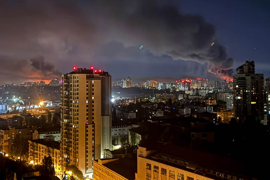 Smoke billows over Kyiv following a massive Russian strike on July 4, 2025, just hours after Donald Trump’s call with Volodymyr Zelenskyy and amid halted U.S. munitions shipments to Ukraine.