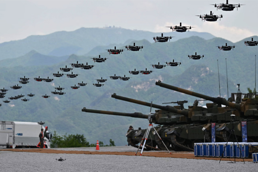 South Korean military drones fly in formation during a military drill in May 2023.