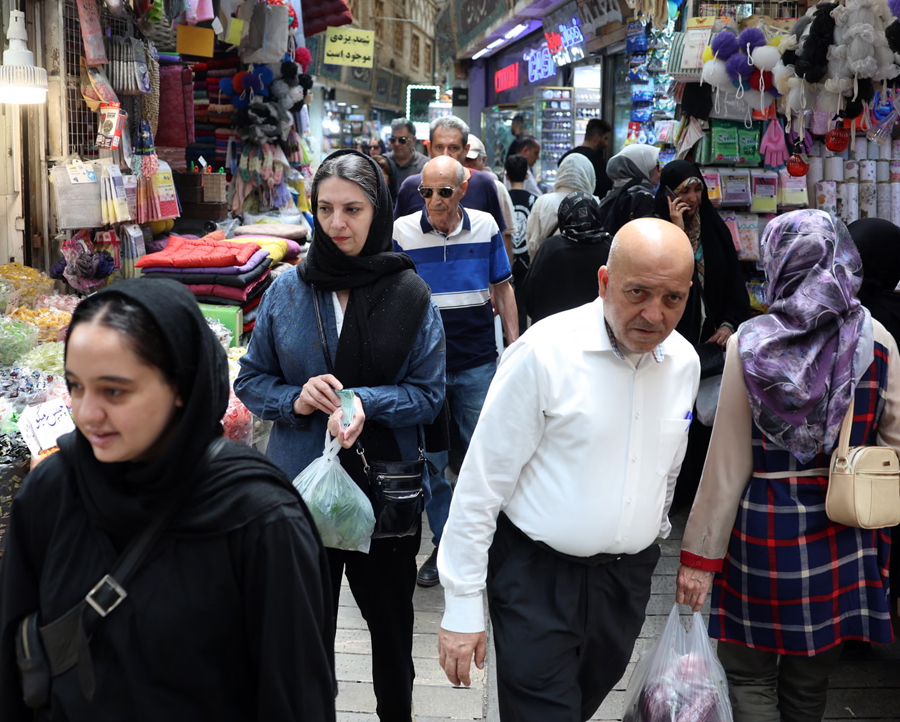 A bazaar in Tehran in June. Iranians' buying power is being decimated by runaway food and fuel inflation and currency depreciation.