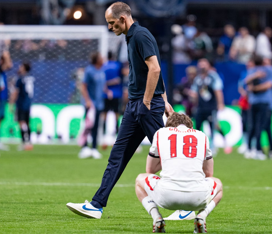Thomas Tuchel, England's head coach, walks off in dismay after the defeat