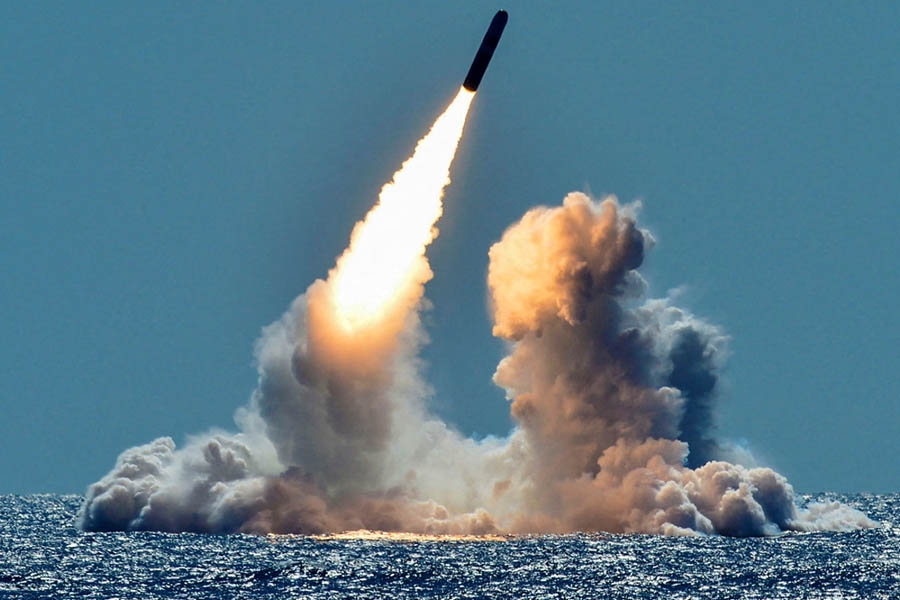 Trident II D5 missile being launched from a US submarine during a 2018 test, representing the nuclear-capable strategic weapons system of the United States.