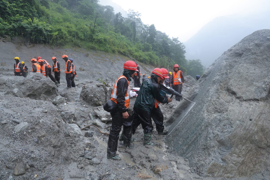 Drilling is underway to rescue people trapped in the tunnel of the Trishuli '3-A' hydroelectric project due to flooding.