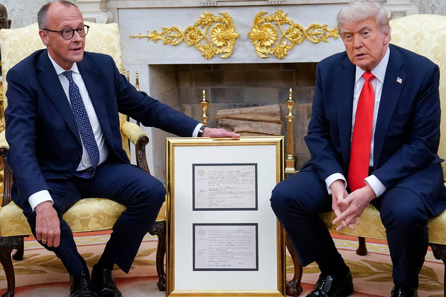 Friedrich Merz presented Trump with what he said was the birth certificate of the US president’s grandfather when they met in the White House on Thursday.