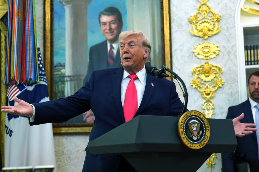 Donald Trump speaking in the Oval Office at the swearing-in of Homeland Security Secretary Markwayne Mullin.