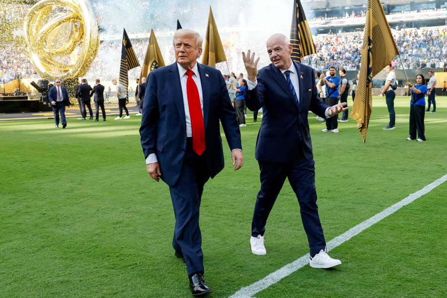 US President Donald Trump stands alongside FIFA President Gianni Infantino during the Club World Cup final at MetLife Stadium, drawing boos as Chelsea lifted the trophy.
