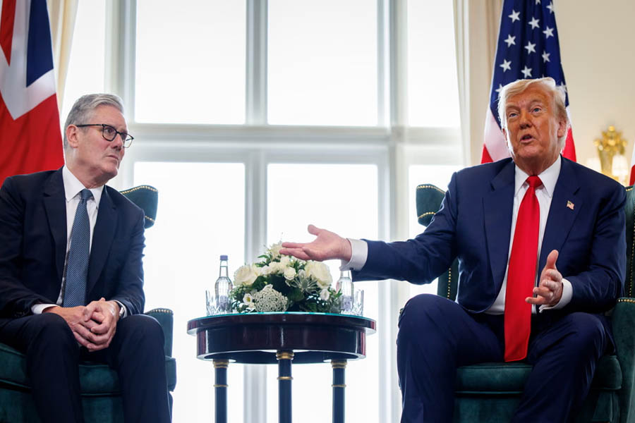 Donald Trump and UK Prime Minister Keir Starmer speak to the media at Turnberry, Scotland, amid talks on Ukraine peace and sanctions.