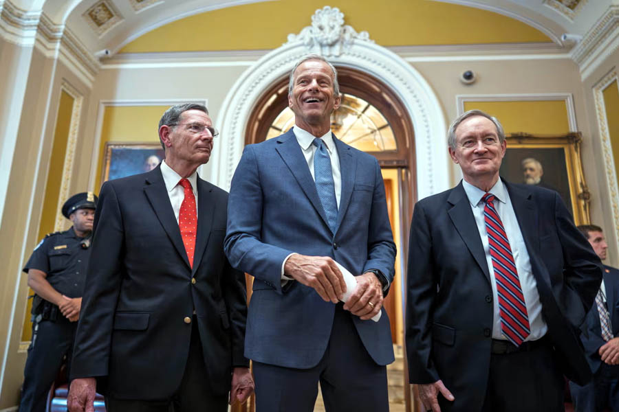 Senate Majority Leader John Thune, alongside GOP Whip John Barrasso and Finance Committee Chair Mike Crapo, speaks at the Capitol after Senate passes Trump-backed tax and spending bill on Tuesday.