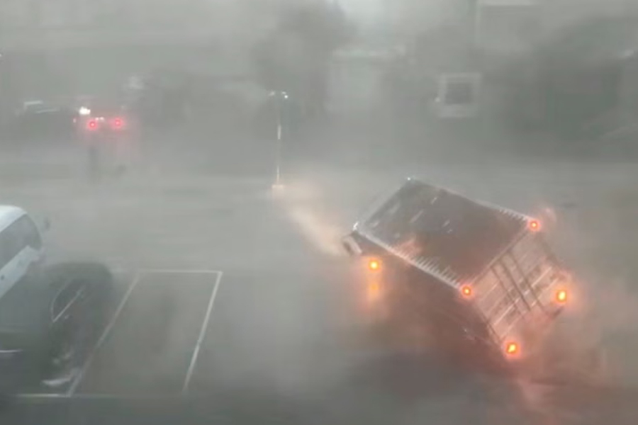A truck is overturned by strong winds in Wenzhou as Typhoon Dolphin makes landfall