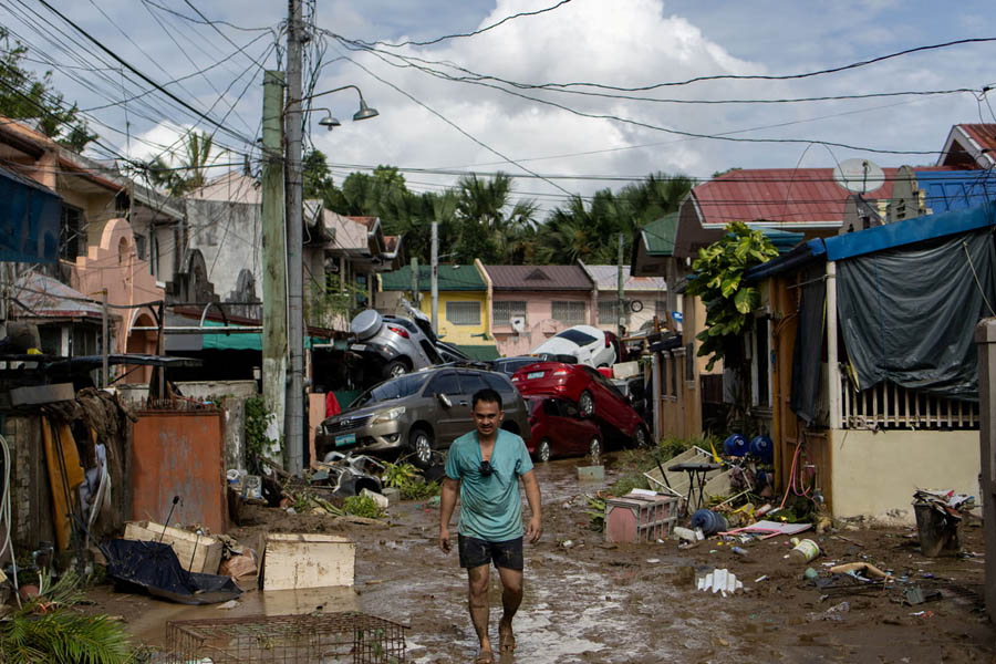 Residents being rescued from flooded homes in Cebu, Philippines, after Typhoon Kalmaegi caused widespread devastation and prompted a state of emergency declaration.