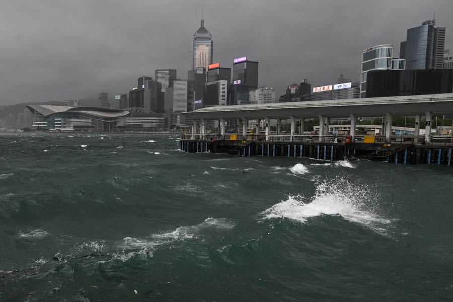 Dark clouds loom over Victoria Harbour as Typhoon Wipha triggers Hong Kong’s highest hurricane warning, Signal No. 10.