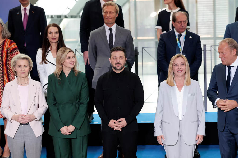 Leaders including Meloni, Zelenskyy, Zelenska, von der Leyen, and Tusk pose for a family photo at the Ukraine Recovery Conference in Rome.