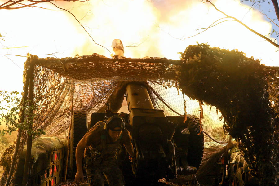 Ukrainian troops fire a howitzer at Russian positions on the Donetsk frontline, as Donald Trump signals a possible three-way summit with Vladimir Putin and Volodymyr Zelenskyy if upcoming talks in Alaska go well.