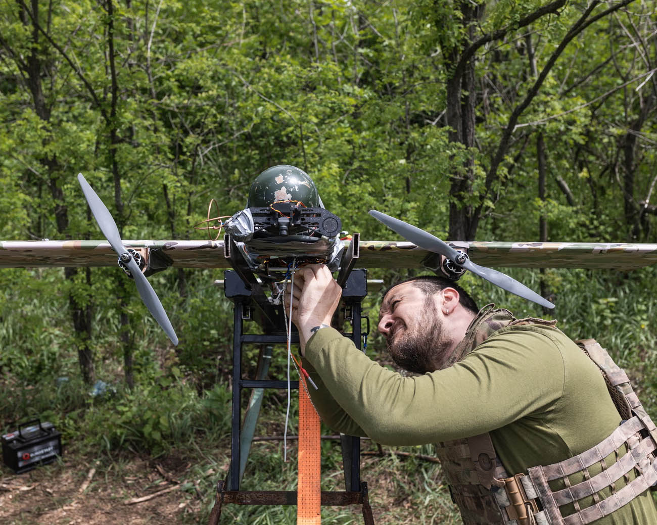 Ukrainian soldier preparing Bliskavka attack drone
