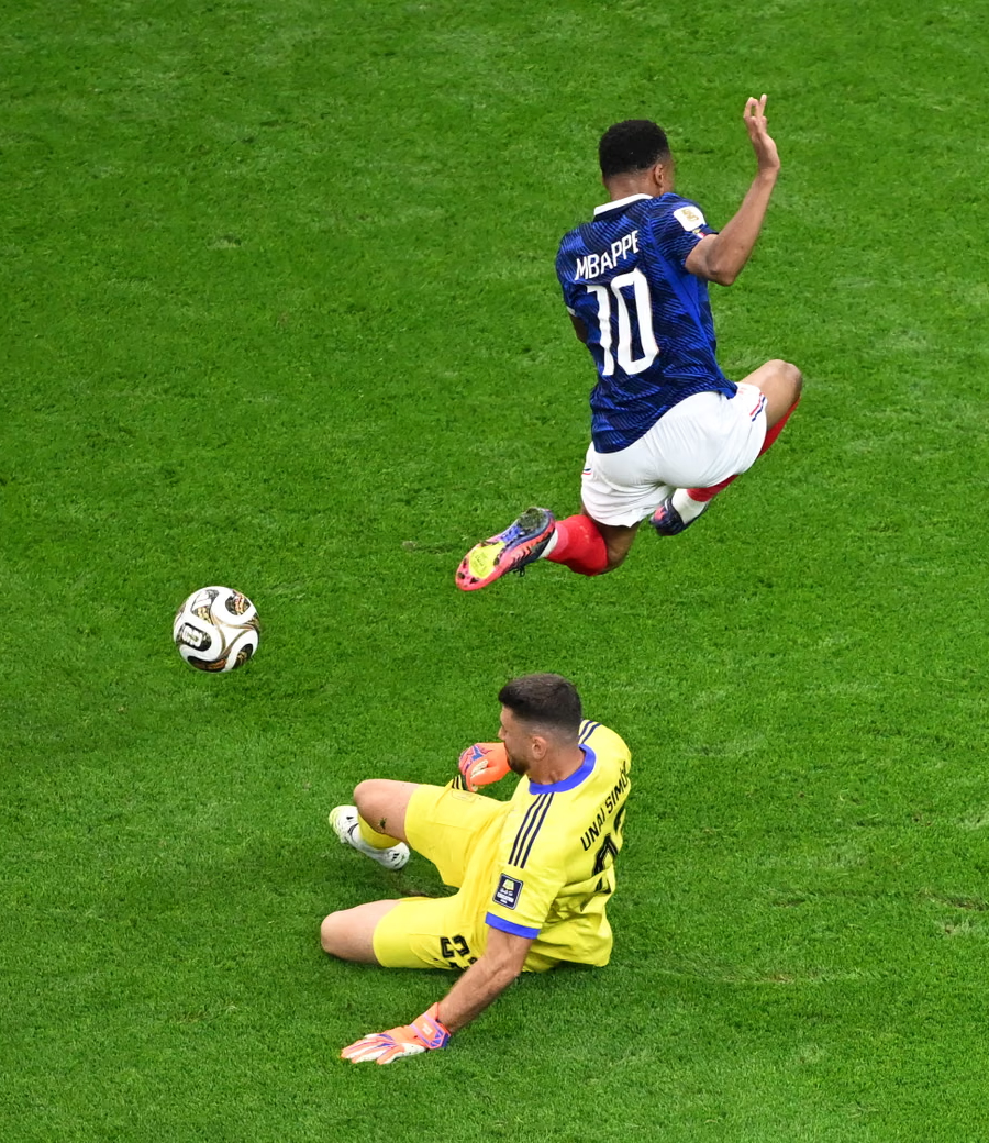Spain's keeper Unai Simon is fleeter of foot than France's Kylian Mbappe