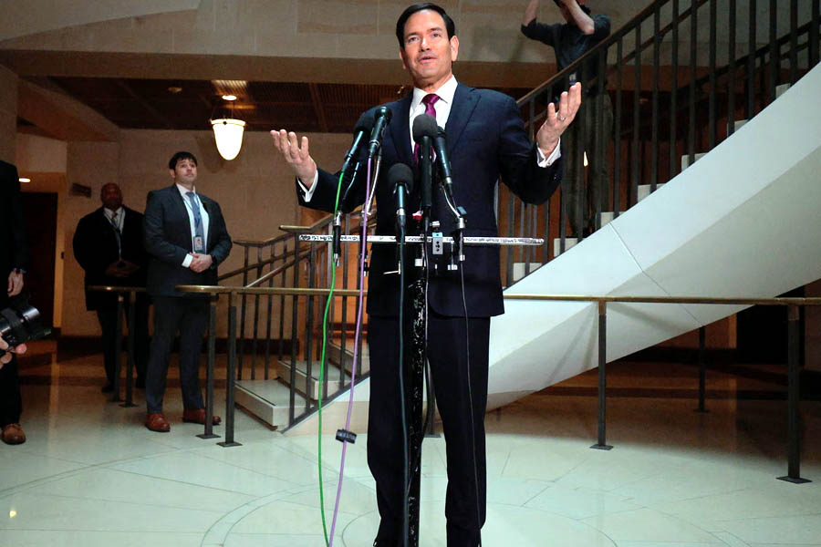 Marco Rubio speaking to reporters at a press briefing about the US pre-emptive military strike on Iran to defend American troops in anticipation of a planned Israeli attack.