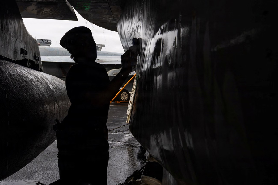 A sailor on the flight deck of the USS Abraham Lincoln on 9 August 2026.