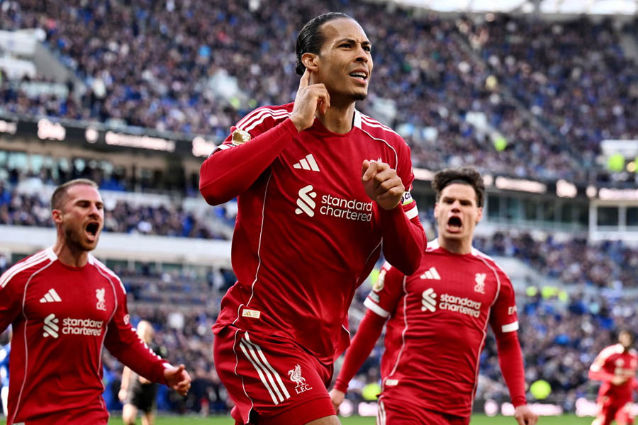 Virgil van Dijk celebrates after scoring Liverpool's dramatic late winner in the Merseyside derby against Everton.
