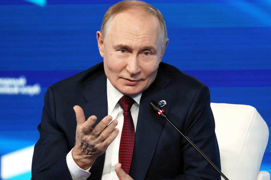 Vladimir Putin at the Valdai Discussion Club in Sochi, speaking on Russia’s stance toward NATO, Ukraine, and escalating tensions with Europe.