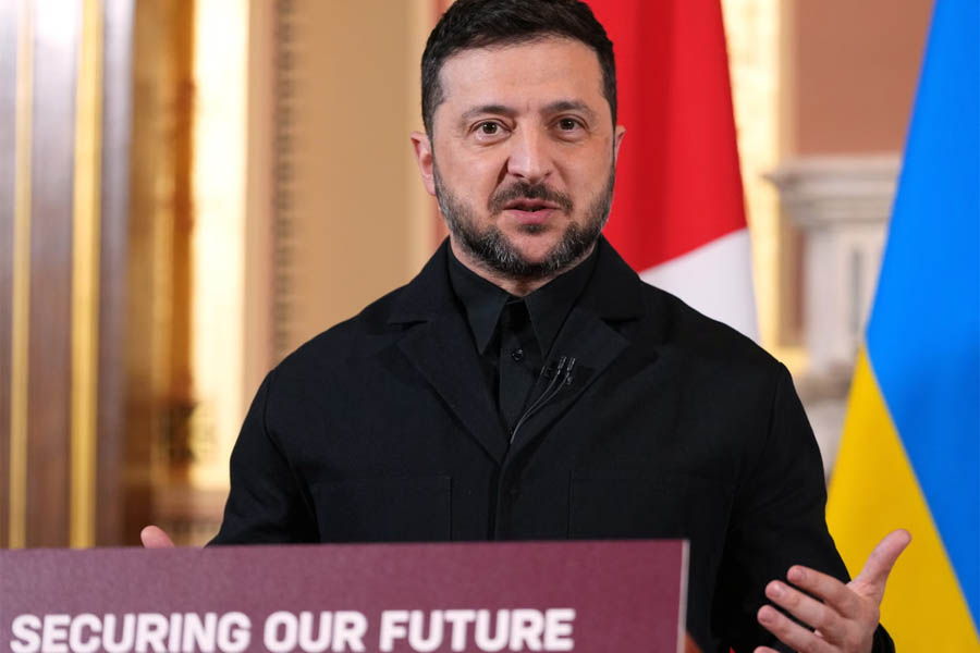 Ukrainian President Volodymyr Zelenskyy speaking to reporters alongside UK Prime Minister Keir Starmer after a coalition meeting in London.