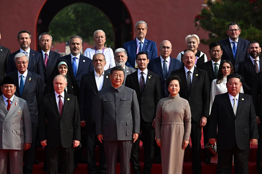 World leaders standing together for a group photo before Beijing military parade commemorating 80th anniversary of victory over Japan.