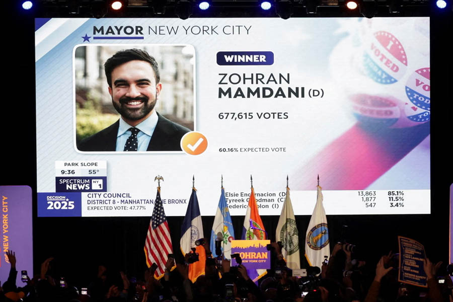 Zohran Mamdani celebrating on stage at his election watch party after being declared the winner of the New York City mayoral race.